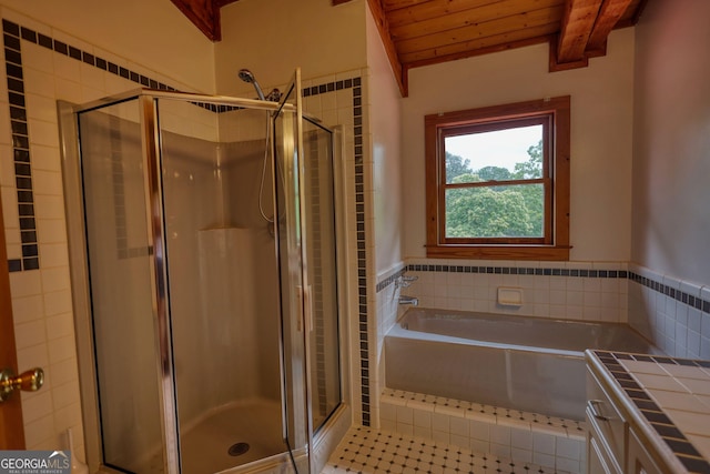 2905 Cammie Wages Rd, Dacula, GA 30019 - full bath featuring a shower stall, a garden tub, tile patterned floors, wood ceiling, and tile walls