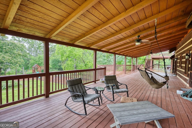 2905 Cammie Wages Rd, Dacula, GA 30019 - wooden terrace with a playground, a yard, and a ceiling fan