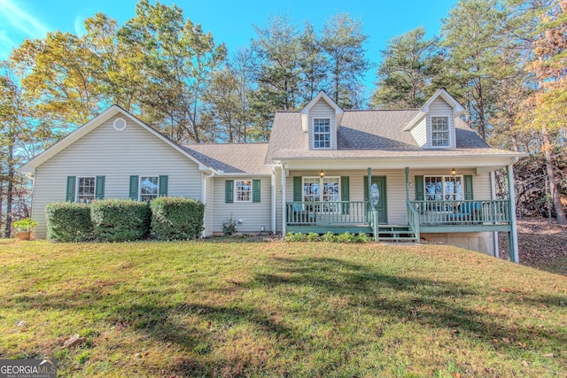 32 N Muscogee Dr, Ellijay, GA 30540 - view of front facade with covered porch, a front lawn, and roof with shingles