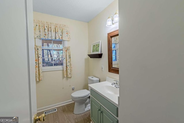 32 N Muscogee Dr, Ellijay, GA 30540 - half bathroom featuring vanity and wood finished floors