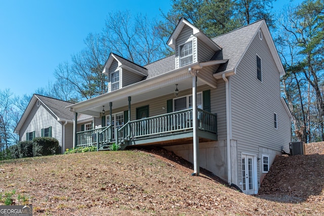 32 N Muscogee Dr, Ellijay, GA 30540 - view of front of home with french doors, a porch, and a shingled roof