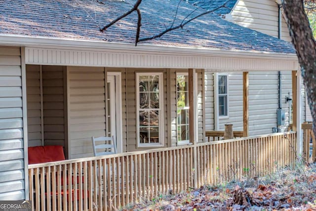 32 N Muscogee Dr, Ellijay, GA 30540 - doorway to property featuring roof with shingles and covered porch