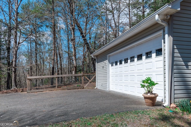 32 N Muscogee Dr, Ellijay, GA 30540 - garage featuring asphalt driveway