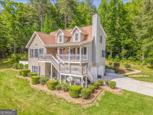 4441 Manning Mill Rd, Summerville, GA 30747 - view of front facade with a porch, stairway, stone siding, concrete driveway, and a garage
