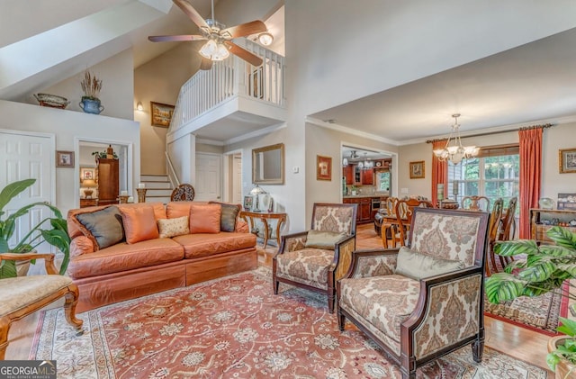 4441 Manning Mill Rd, Summerville, GA 30747 - living room featuring a high ceiling, a chandelier, a ceiling fan, wood finished floors, and stairs