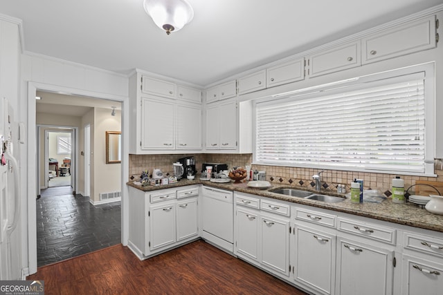 24 Brookside Dr, Newnan, GA 30263 - kitchen with dishwasher, a sink, decorative backsplash, white cabinets, and ornamental molding