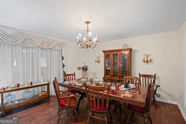 24 Brookside Dr, Newnan, GA 30263 - dining space with a chandelier, wood finished floors, and baseboards