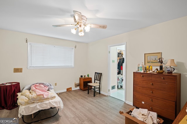 24 Brookside Dr, Newnan, GA 30263 - living area with light wood-type flooring, a ceiling fan, and baseboards