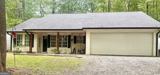 160 W Fork Dr, Newnan, GA 30263 - ranch-style home featuring gravel driveway, a garage, and roof with shingles