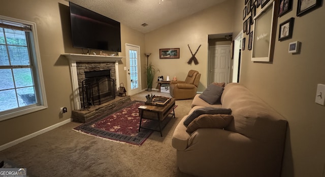 160 W Fork Dr, Newnan, GA 30263 - carpeted living area with lofted ceiling, plenty of natural light, baseboards, and a fireplace