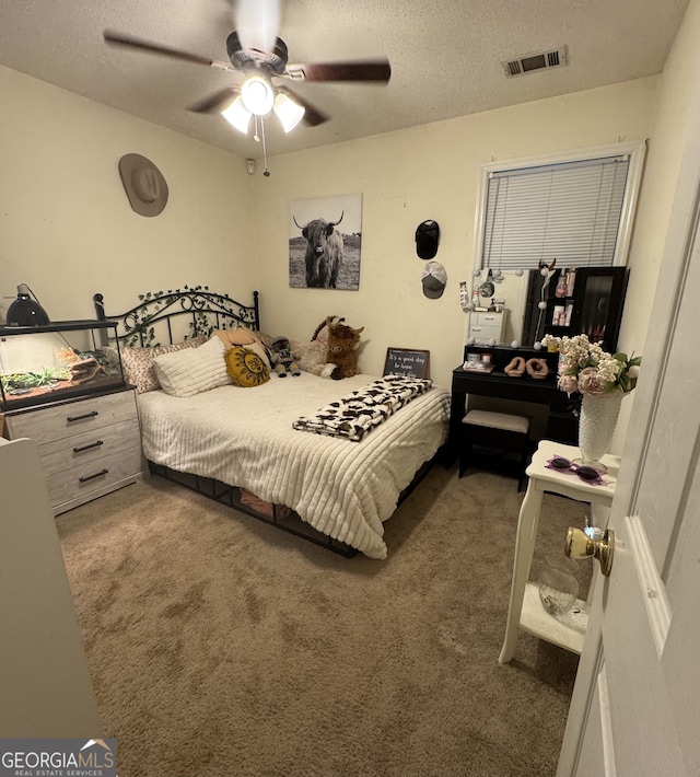 160 W Fork Dr, Newnan, GA 30263 - bedroom featuring carpet, a textured ceiling, and a ceiling fan