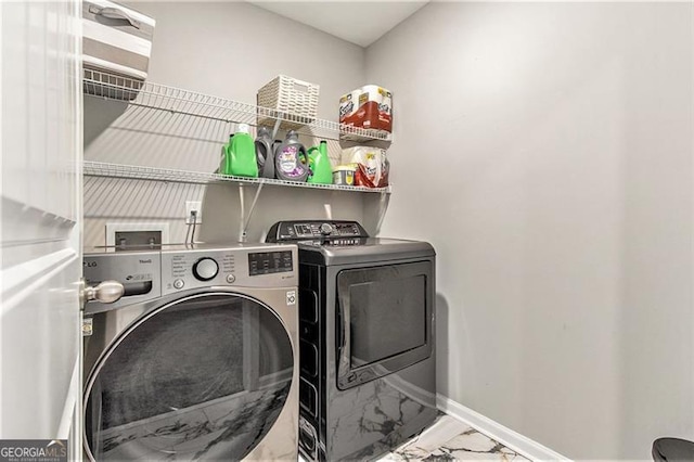 413 Huntleigh Shores Ln, Dallas, GA 30132 - washroom featuring washer and clothes dryer and marble finish flooring