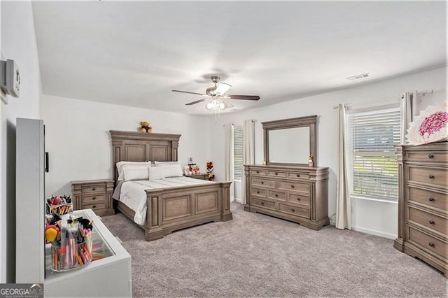 413 Huntleigh Shores Ln, Dallas, GA 30132 - bedroom featuring light carpet, a ceiling fan, and a wall mounted AC