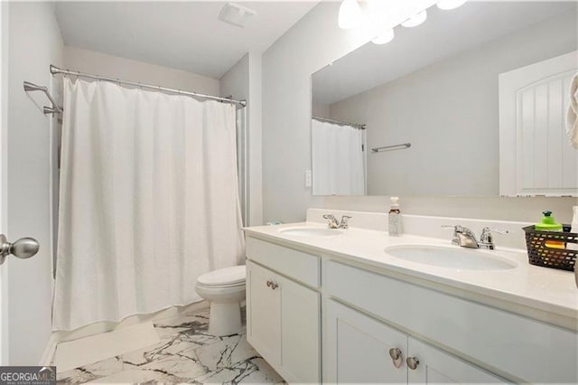 413 Huntleigh Shores Ln, Dallas, GA 30132 - bathroom with double vanity and marble look tile flooring
