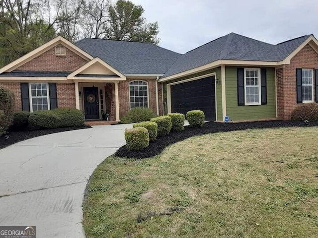 141 Simsbury Ln, Macon, GA 31220 - single story home featuring brick siding, concrete driveway, a garage, and covered porch