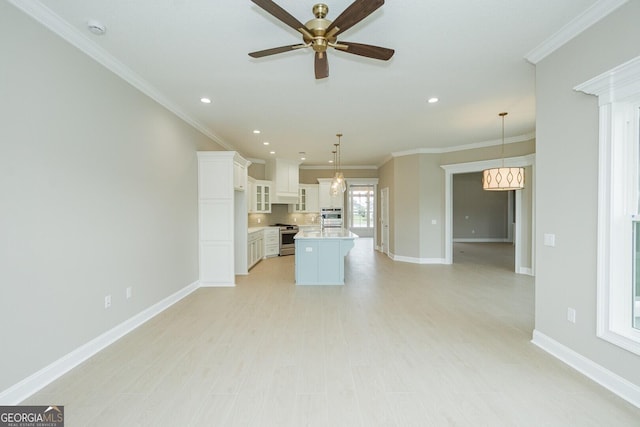 215 Jake Colton Dr, Kingsland, GA 31548 - unfurnished living room featuring a ceiling fan, ornamental molding, baseboards, recessed lighting, and light wood finished floors
