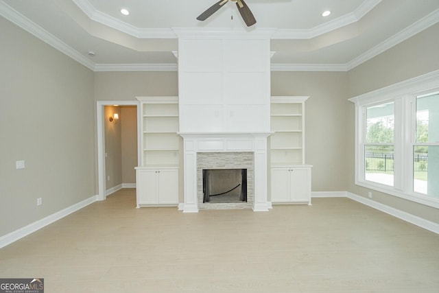 215 Jake Colton Dr, Kingsland, GA 31548 - unfurnished living room with ceiling fan, ornamental molding, a tile fireplace, baseboards, and recessed lighting