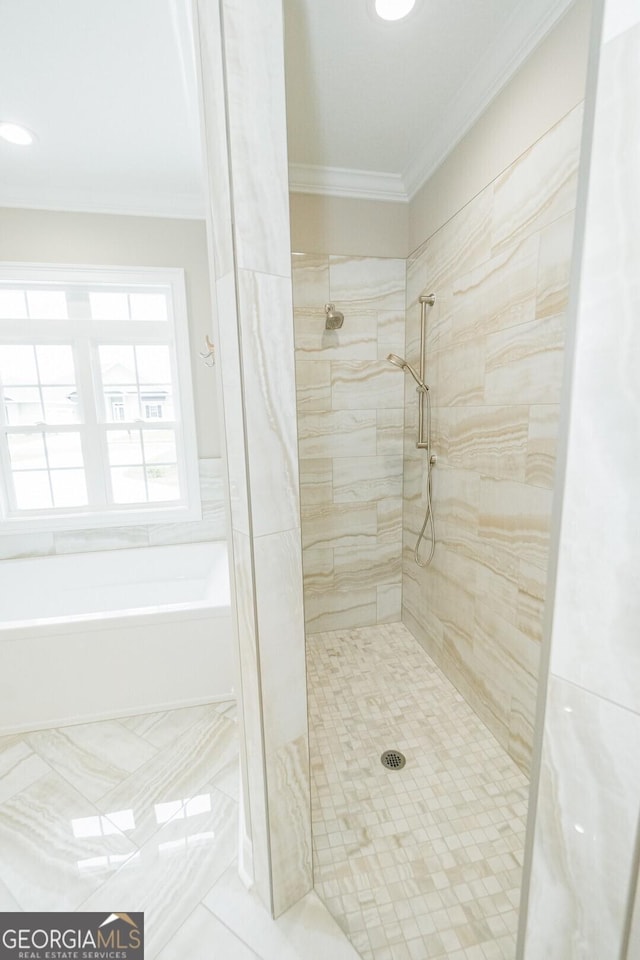 215 Jake Colton Dr, Kingsland, GA 31548 - bathroom with a tile shower, ornamental molding, tile patterned flooring, and a bath