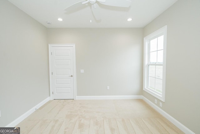 215 Jake Colton Dr, Kingsland, GA 31548 - spare room with ceiling fan, light colored carpet, recessed lighting, a smoke detector, and baseboards