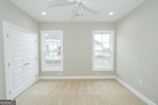 215 Jake Colton Dr, Kingsland, GA 31548 - unfurnished bedroom featuring light carpet, baseboards, a closet, and recessed lighting