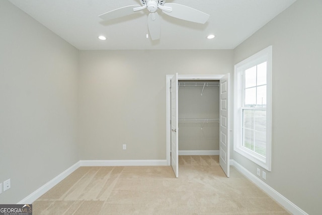 215 Jake Colton Dr, Kingsland, GA 31548 - unfurnished bedroom featuring a closet, light colored carpet, baseboards, recessed lighting, and ceiling fan