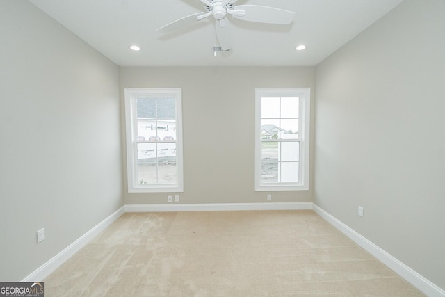 215 Jake Colton Dr, Kingsland, GA 31548 - unfurnished room with ceiling fan, light colored carpet, baseboards, and recessed lighting