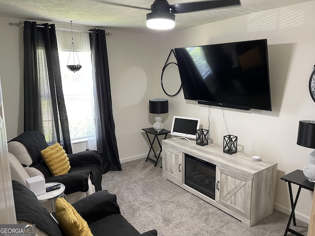 401 Bainbridge Dr, Mcdonough, GA 30253 - living area featuring light colored carpet, baseboards, a textured ceiling, and a ceiling fan