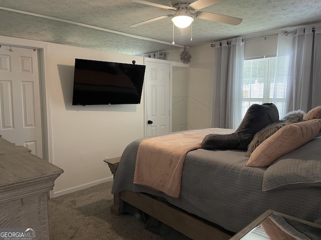 401 Bainbridge Dr, Mcdonough, GA 30253 - carpeted bedroom with a textured ceiling, a ceiling fan, and baseboards