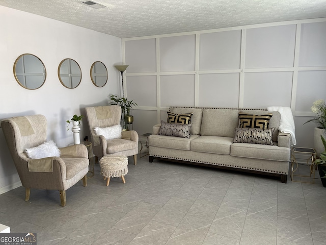 401 Bainbridge Dr, Mcdonough, GA 30253 - living room with a textured ceiling