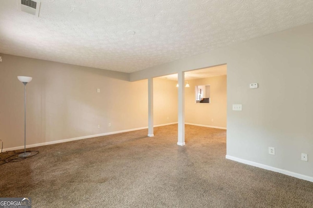 1851 Grove Way, Hampton, GA 30228 - finished below grade area featuring a textured ceiling and carpet floors