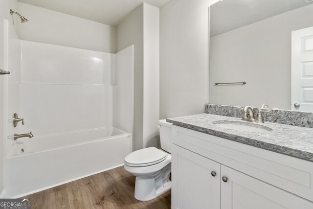 68 Davis Lake Rd Lot 16, Thomaston, GA 30286 - bathroom with wood finished floors, vanity, toilet, and shower / tub combination