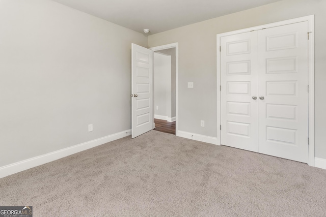68 Davis Lake Rd Lot 16, Thomaston, GA 30286 - unfurnished bedroom with carpet, baseboards, and a closet