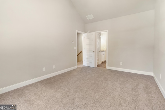 68 Davis Lake Rd Lot 16, Thomaston, GA 30286 - unfurnished bedroom with carpet, baseboards, high vaulted ceiling, and ensuite bathroom