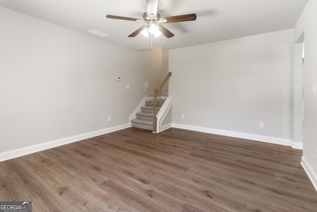 68 Davis Lake Rd Lot 16, Thomaston, GA 30286 - empty room featuring a ceiling fan, stairway, wood finished floors, and baseboards