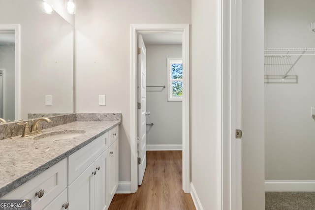 68 Davis Lake Rd Lot 16, Thomaston, GA 30286 - bathroom with vanity, baseboards, and wood finished floors