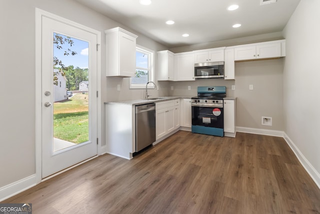 68 Davis Lake Rd Lot 16, Thomaston, GA 30286 - kitchen featuring appliances with stainless steel finishes, white cabinetry, recessed lighting, a sink, and dark wood-type flooring