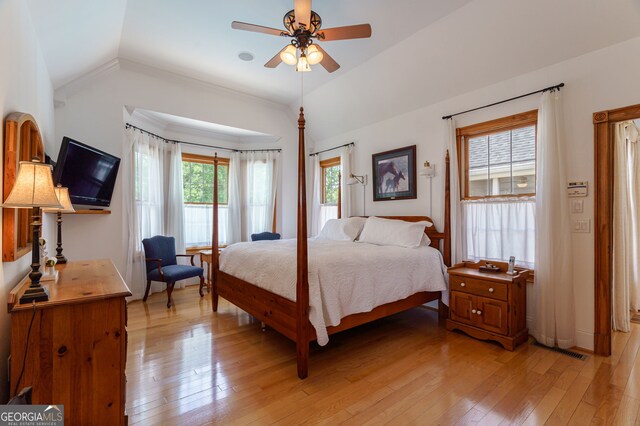 4320 Sandy Creek Rd, Madison, GA 30650 - bedroom featuring lofted ceiling, light wood finished floors, and a ceiling fan