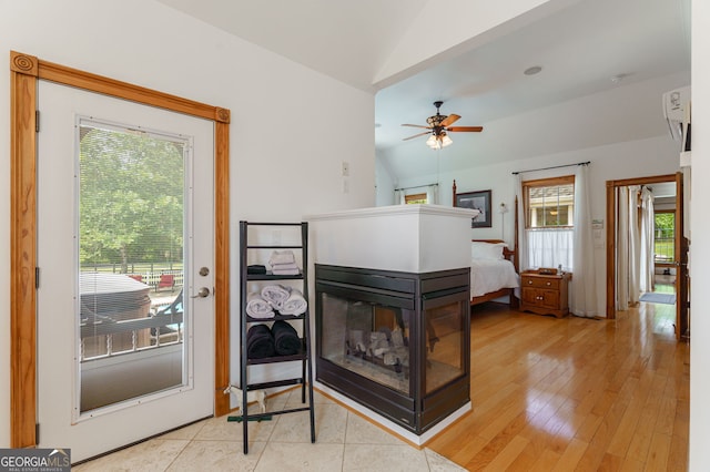 4320 Sandy Creek Rd, Madison, GA 30650 - living area with lofted ceiling, a ceiling fan, and light wood-type flooring