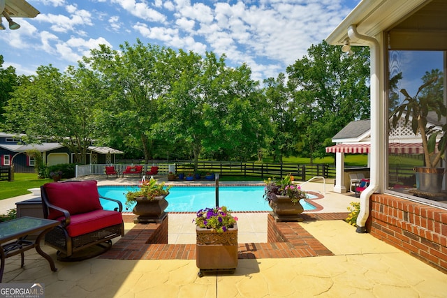 4320 Sandy Creek Rd, Madison, GA 30650 - view of swimming pool with a patio and a fenced backyard