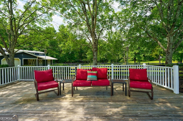 4320 Sandy Creek Rd, Madison, GA 30650 - deck featuring an outdoor hangout area and view of scattered trees