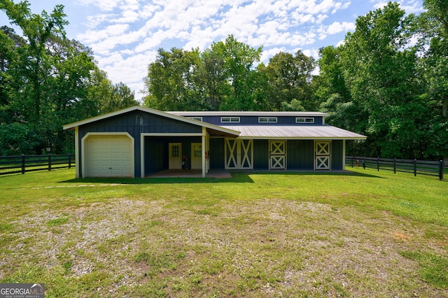 4320 Sandy Creek Rd, Madison, GA 30650 - mid-century modern home with metal roof, a garage, and board and batten siding