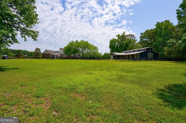 4320 Sandy Creek Rd, Madison, GA 30650 - view of yard featuring a barn and an outbuilding