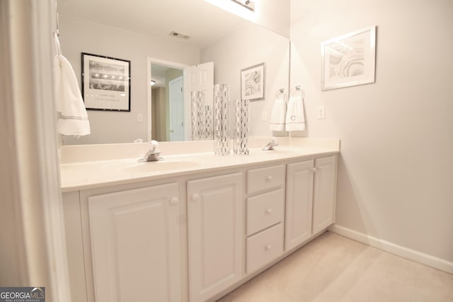 318 Ivy Manor Dr, Marietta, GA 30064 - full bathroom with double vanity and baseboards