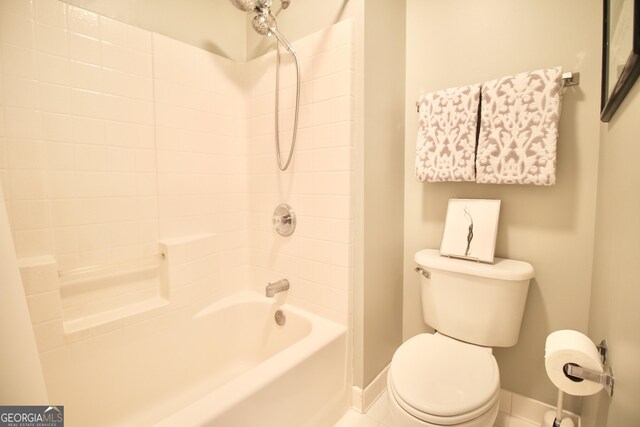318 Ivy Manor Dr, Marietta, GA 30064 - bathroom featuring toilet, baseboards, and washtub / shower combination