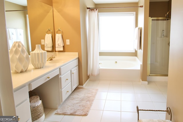 318 Ivy Manor Dr, Marietta, GA 30064 - bathroom with a garden tub, a shower stall, vanity, tile patterned flooring, and baseboards