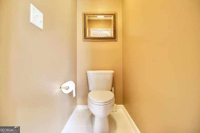 318 Ivy Manor Dr, Marietta, GA 30064 - bathroom featuring toilet, tile patterned flooring, and baseboards