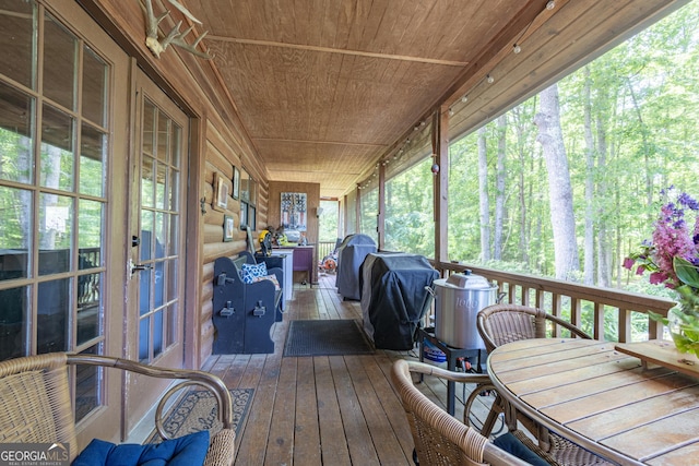 912 Folds Rd, Carrollton, GA 30116 - wooden terrace featuring outdoor dining space, grilling area, and an outdoor living space
