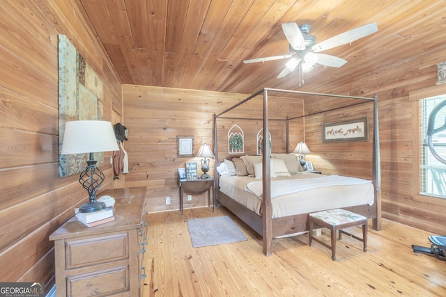 912 Folds Rd, Carrollton, GA 30116 - bedroom featuring wooden ceiling, wooden walls, and hardwood / wood-style flooring