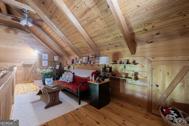 912 Folds Rd, Carrollton, GA 30116 - living room with wood ceiling, wooden walls, wood-type flooring, and a ceiling fan