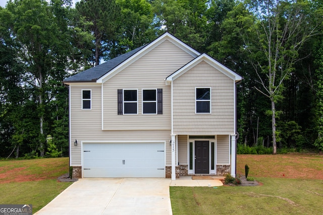 215 Davis Lake Ct Lot 2, Thomaston, GA 30286 - view of front facade with a front yard, a garage, concrete driveway, and brick siding